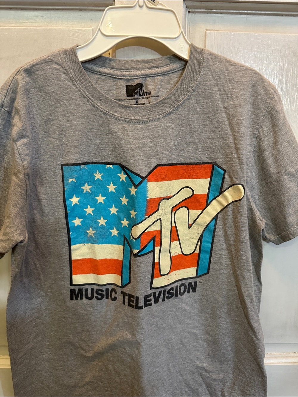 MTV Gray Tee with Red, White & Blue Flag Logo